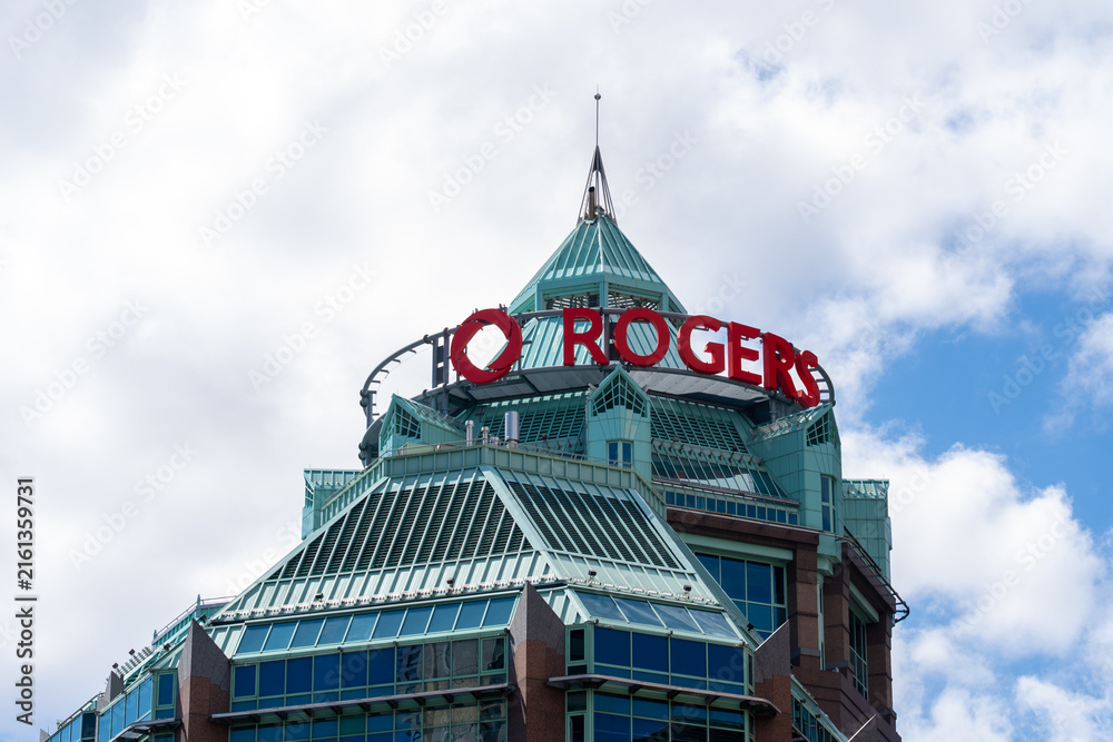 Fototapeta premium Toronto, ON, Canada - August 17, 2026: Rogers Communications corporate headquarters building located in downtown Toronto, Ontario, Canada. Rogers is a major Canadian telecommunications and media congl