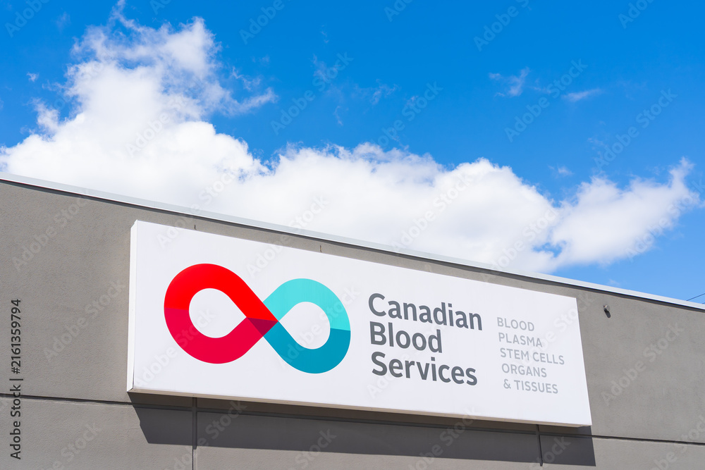 Fototapeta premium Toronto, ON, Canada - August 17, 2026: Exterior sign for Canadian Blood Services on the building at a Blood donation center in Toronto, ON, Canada. Canadian Blood Services is the national, not-for-pro