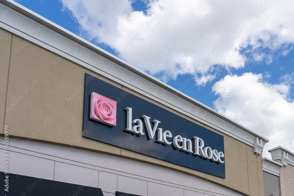 Fototapeta premium Toronto, ON, Canada - August 17, 2026: La Vie en Rose store sign on the building in Toronto, ON, Canada. La Vie en Rose is a Canadian specialty lingerie, sleepwear, and swimwear retailer. 