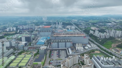 Aerial Drone View of Advanced Semiconductor Chip Manufacturing Plant and Industrial Complex in Icheon, South Korea