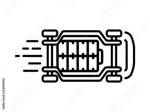 Undercarriage of a moving car showcasing its engine and wheels while in motion