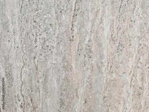 фотографія High-resolution overhead shot of beige travertine marble stone texture featuring vertical veining and pitted detailing