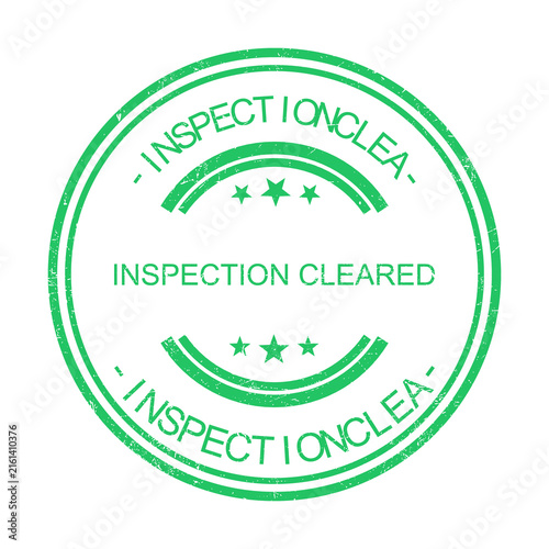 Green inspection logo stamp with official and quality approval text