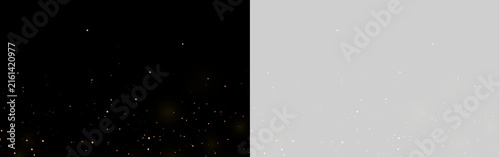 Fotografie Scattered glowing golden particles with a transparent background for overlay eff