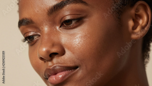 Melanin Rich Black Woman with Radiant Glowing Skin Texture
