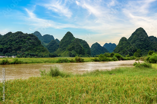 Photography The natural landscape of Phong Nam, Cao Bang Province, Vietnam, featuring limestone mountains and a flowing stream