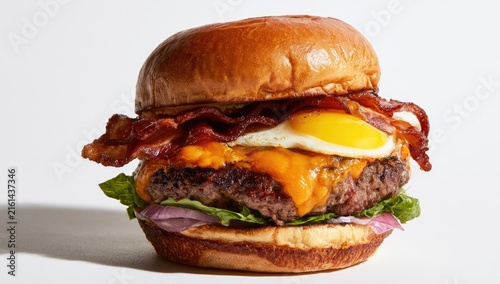 Gourmet Bacon Cheeseburger with Fried Egg and Lettuce.