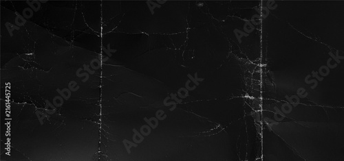 Fotografie Black Creased Paper Texture Background with Fine Scratches