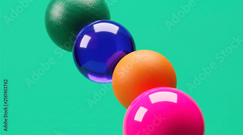 Abstract 3D composition of colorful textured spheres including glass and matte surfaces against a vibrant teal background