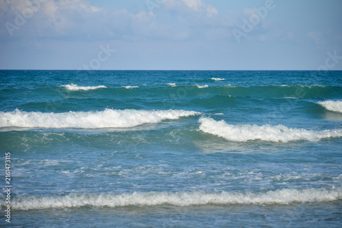NHA TRANG, VIETNAM – MAY 10, 2026: Waves breaking along the shoreline at Cam Ranh Beach in Nha Trang, Vietnam.