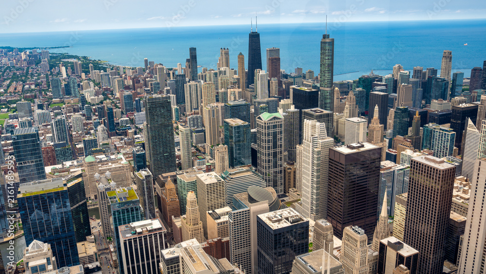 Obraz premium Chicago, IL - July 24, 2024: Aerial view of Chicago skyline. Skyscrapers and city landmarks