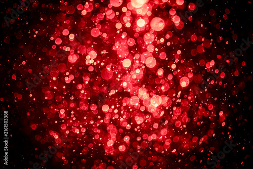 Blurred photo with red dots visible glittering, shining brightly look and feel luxurious