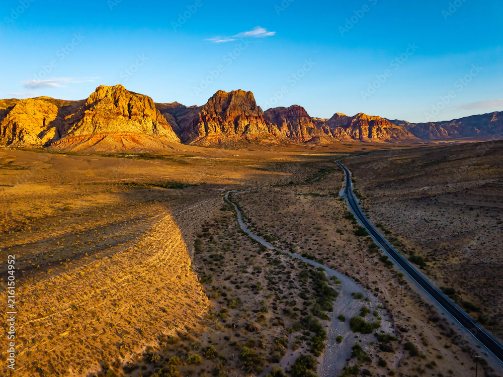 Naklejka premium Sunrise aerial view over Red Rock Canyon mountains