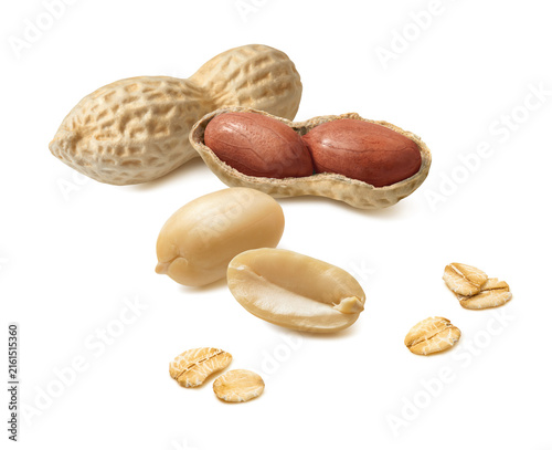 Peanuts and oat flakes isolated on white background. Real photography.