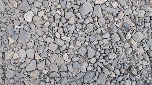 Gray crushed stone aggregate texture, coarse gravel background