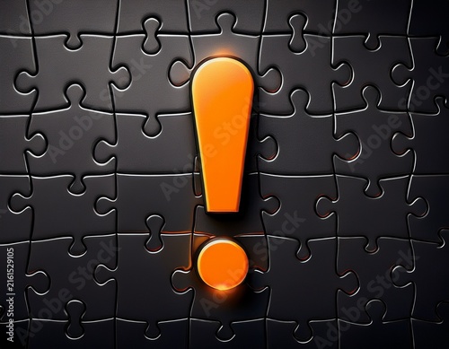 black puzzle piece with orange exclamation mark