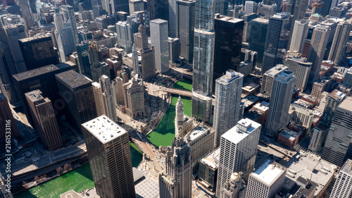 Green-dyed Chicago River winding through downtown