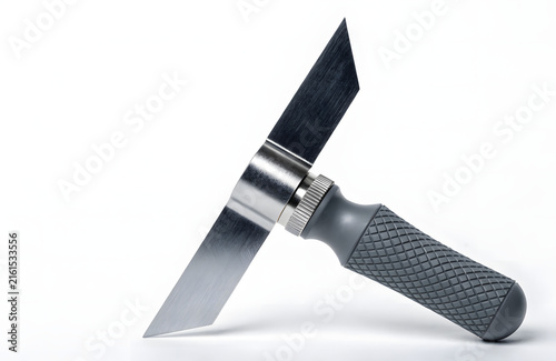 Handheld deburring tool for metal finishing and edge smoothing isolated on white background