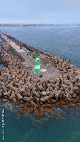 Aerial view of lighthouse and breakwater in Aveiro, portugal
