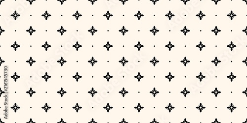 Geometric floral seamless pattern. Simple black flowers on a cream background. Seamless black floral star pattern on beige background. Repeatable abstract graphic for design, texture, or wallpaper.