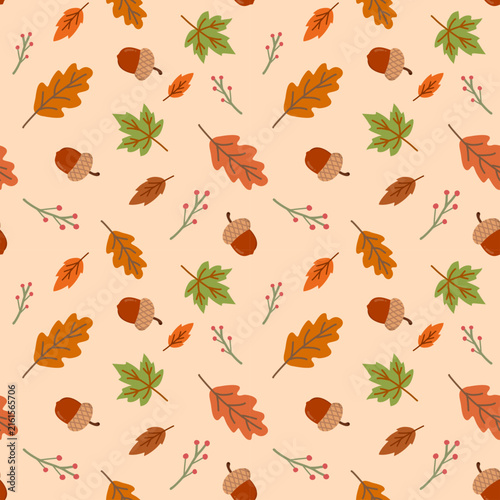 Cute autumn seamless pattern with colorful leaves, acorns and berries on a warm cream background