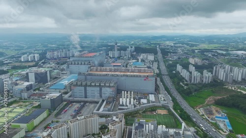 Aerial Drone View of Advanced Semiconductor Chip Manufacturing Plant and Industrial Complex in Icheon, South Korea