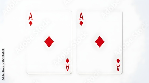Two ace of diamonds playing cards placed side by side on a clean surface