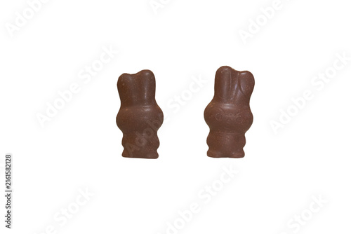 Two chocolate Easter bunnies isolated on white background, Milk chocolate rabbit candies side and front view isolated