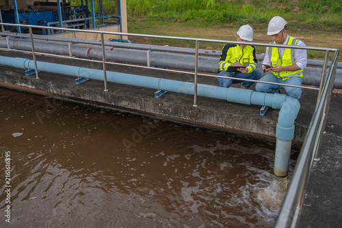 Environmental engineers work at wastewater treatment plants,Water supply engineering working at Water recycling plant for reuse