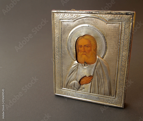 Принти на полотні An old icon depicting Jesus Christ against a dark background; an icon as a symbol of Christianity