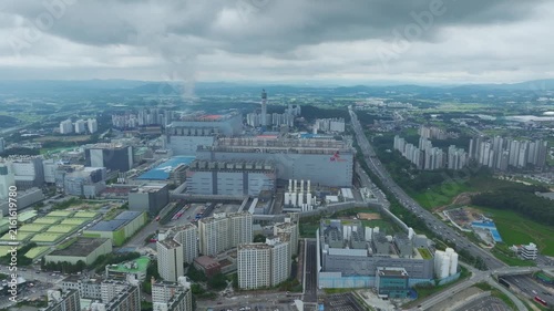 Aerial Drone View of Advanced Semiconductor Chip Manufacturing Plant and Industrial Complex in Icheon, South Korea