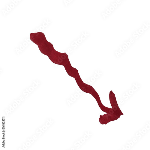 A single hand drawn red arrow pointing down to the right made with ink brush strokes on a flat surface area