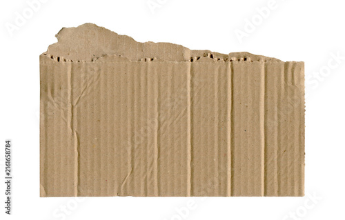 Single torn piece of beige corrugated cardboard with visible vertical ridges and rough uneven edges, isolated on a white background.