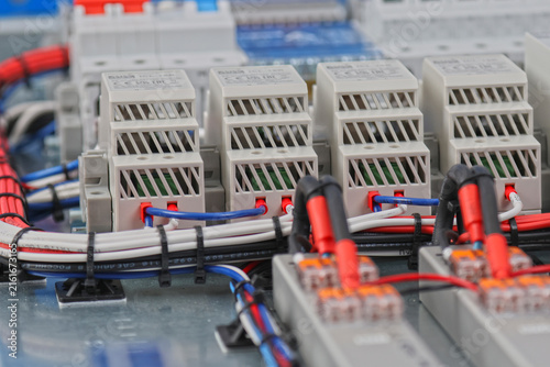 Connect electrical modules using electrical insulated wiring wires in the electrical control panel. 