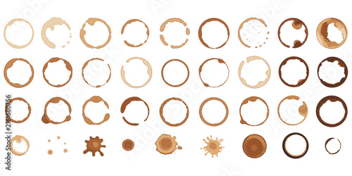 Collection of various coffee cup ring stains and brown liquid splashes isolated on a white background, featuring diverse circular marks, textured rings, and messy beverage spills