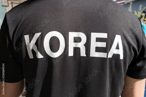 Black T-shirt featuring white 