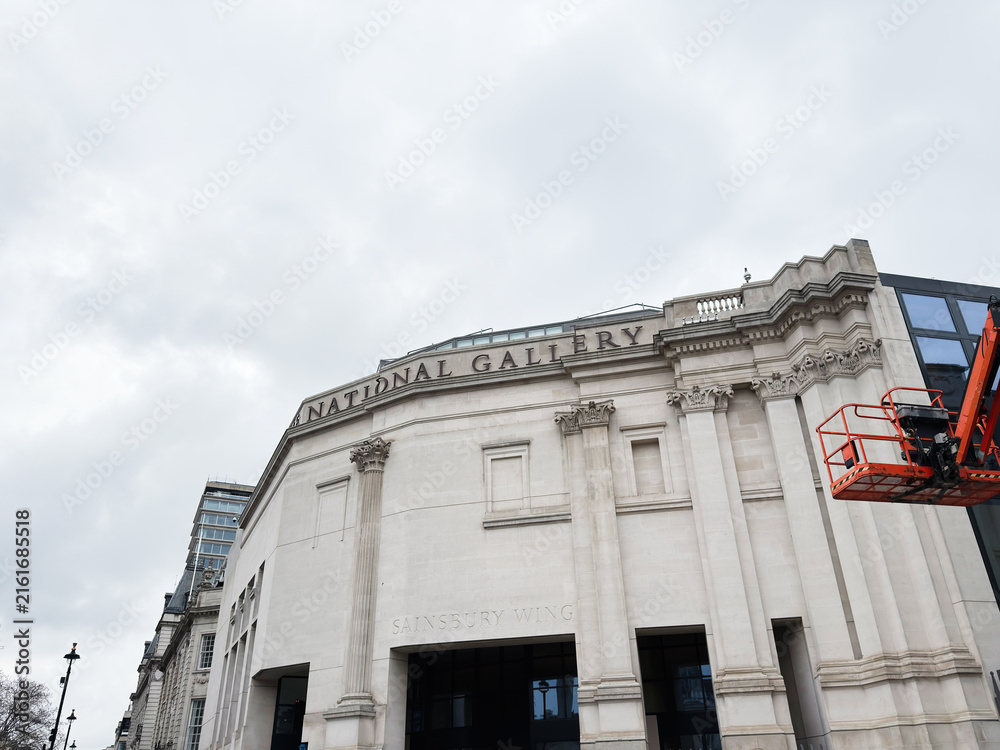 Fototapeta premium National Gallery Sainsbury Wing facade in London UK with classical architecture and cloudy sky