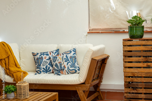 Konstfotografi Stylish terrace lounge with outdoor sofa and natural decor