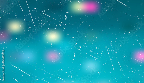 Abstract vintage blue background with bokeh lights, scratches, and dust particles creating a retro, dreamy atmosphere