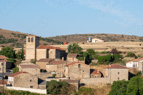 Close-Up View of Stone Church Bell Tower in Rural Spanish Village