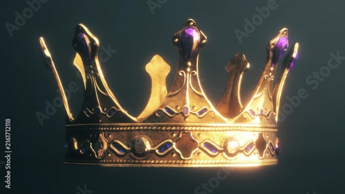 Rotating Golden Royal Crown With Purple Gemstones on Dark Background