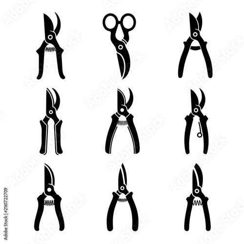 Set of black pruning shear and garden scissor silhouettes.