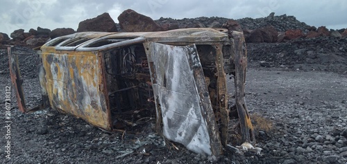 Abandoned vehicle after volcano erupts