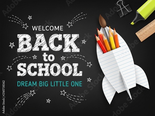 Welcome back to school message with a paper rocket ship filled with colorful pencils on a black chalkboard background for education design
