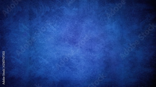 Deep Cobalt Blue Abstract Grunge Textured Background with Smoky Dark Edges