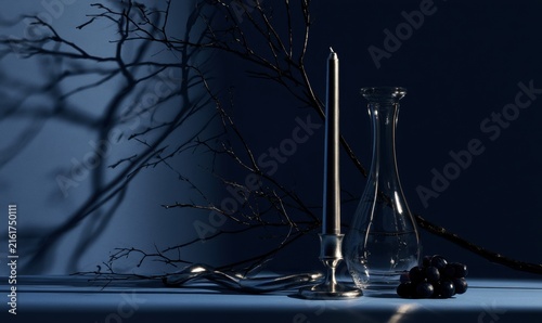 Blue-toned still life with candle, glass, and berries