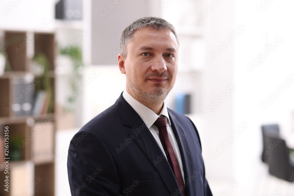 Fototapeta premium Portrait of lawyer wearing jacket in office