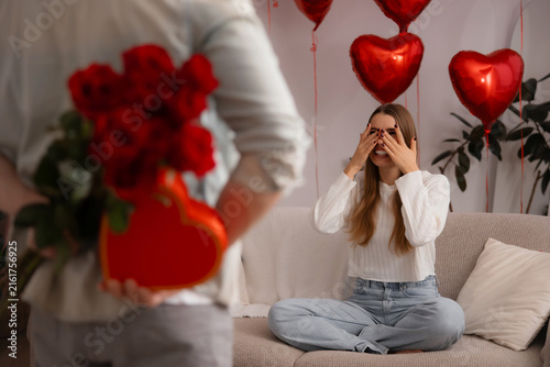 Konstfotografi Woman covering her eyes before romantic Valentine's Day surprise