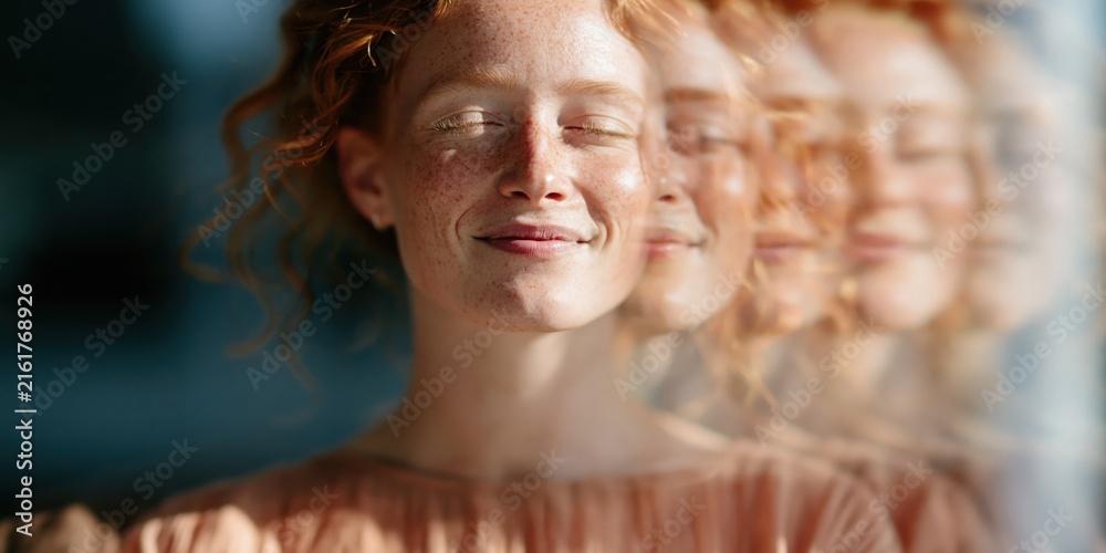 Naklejka premium Closeup smiling redhead woman with soft multiple exposure effect for background portrait banner design