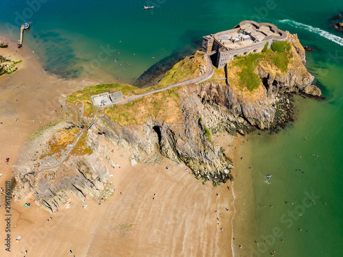 Obraz na plátně High-angle view of tidal island fortress connected by walkway, rocky limestone p